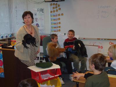 Sully's mother reading and acting out an African folktale.